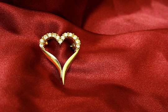 valentine jewelry on red silk